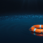 Orange life preserver floating on calm blue ocean water - longevity and life preservation featured on Cyberfulness